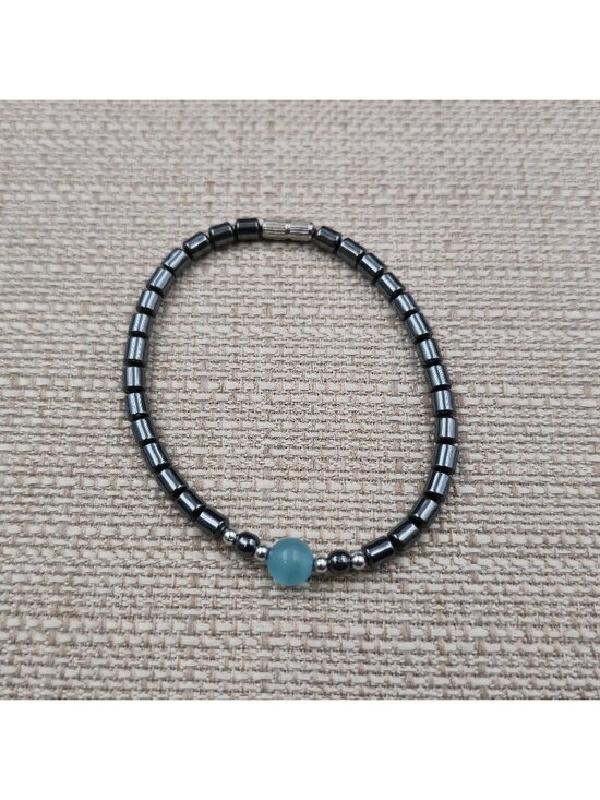 Jewelry - 7 Inch Hematite Cylinder Bracelet with Light Blue Cat's Eye Focal Bead Bracelet